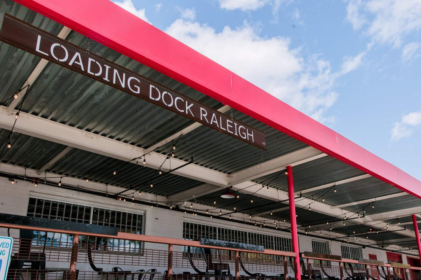 Dock-1053_Exterior_signage-overhead-canopy-string-lights_2025